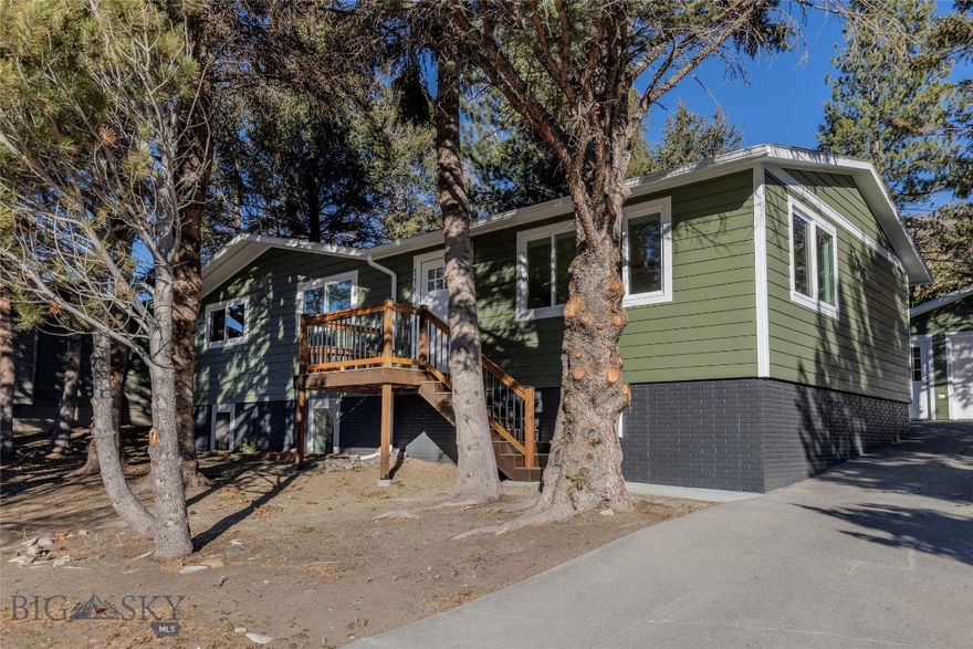 Welcome to this beautifully remodeled 5-bedroom, 3-bath home set on a generous 9,800 SF wooded lot. Thoughtfully renovated inside and out, the home features modern finishes and quality updates throughout. The main level offers a custom kitchen with brand-new appliances and quartz countertops plus a sunny dining area and comfortable living room. Down the hall you'll find a cozy primary bedroom/bath along with two additional bedrooms and full guest bath. Downstairs a spacious living area ideal for entertaining or additional relaxation space is complemented by two more bedrooms perfect for guests, home offices, or a larger household. Two additional flex spaces provide versatile options for a home gym, hobby area, or organized storage. Exterior updates include new low-maintenance siding, new gutters, and a new roof. Mature trees surround the property, offering privacy, shade, and a peaceful outdoor retreat. Conveniently located just minutes from Northside Park and soccer fields, Star Addition Playground, and the Livingston Trail System, this home perfectly blends modern comfort with the Montana lifestyle. Call your favorite real estate professional and schedule a showing today!