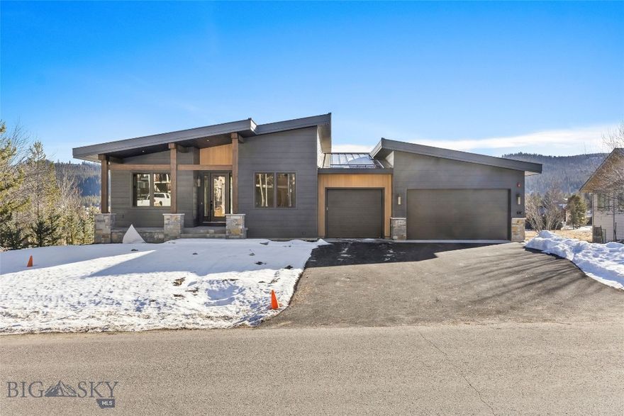 High-End, Contemporary Home In the Meadow Village . Bordering open space and featuring high-quality design throughout, this new Big Sky build is ideal for those seeking luxury living close to the best of Meadow Village. This 5BR/4BA home is near the newly refurbished pond area and golf coarse. Built with high-end, modern finishes, it offers a refined mountain aesthetic with exceptional attention to detail. The main level features an open kitchen/great room with a 14x27 deck; the walk-out lower level offers a family room, covered patio, and guest spaces. From morning walks by the pond to evening gatherings on the deck, every season offers a new way to enjoy the beauty of Big Sky living. Here, nature is your neighbor and adventure begins right outside your door.