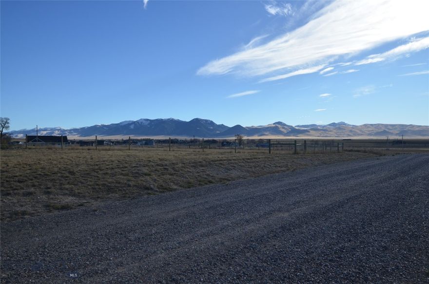 Discover Your Own Slice of Montana Paradise: 4.135 Acres of Pure Country Living
Nestled just three miles south of Dillon, Montana, lies a rare gem—a 4.135-acre lot that offers the kind of breathtaking views and tranquil surroundings that are becoming harder to find. Whether you’re searching for a place to build your dream home, or simply yearning for a peaceful retreat surrounded by nature, this property promises the serenity of country living without sacrificing convenience or adventure.The lot offers panoramic vistas of the Blacktail, Sweetwater, and Pioneer Mountain ranges. These stunning views stretch in every direction, offering a natural canvas that changes with the seasons and the light. Situated at the end of a quiet road, this property offers the rare combination of seclusion and accessibility.  And yet, Dillon, with its charming small-town atmosphere, is just a short drive away, offering all the conveniences you need, including local shops, dining, and services The property is bordered, on the south,  by expansive farmland, ensuring that your views will remain unobstructed for years to come.  For outdoor enthusiasts, this property is a gateway to some of the best recreational opportunities in Montana. Just a short drive away, you’ll find prime big game hunting areas, where you can pursue elk, mule deer, whitetail deer, antelope, and other species in the wide-open spaces of Beaverhead County. Additionally, the region is renowned for its blue-ribbon fishing waters, where you can cast a line in pristine rivers and streams teeming with trout.
Whether you’re looking to hike, hunt, fish, or simply bask in the beauty of your surroundings, this land offers endless opportunities to experience the best of Montana. A Truly Special Place to Call Home!
This is more than just a plot of land; it’s a place where you can create your own sanctuary, surrounded by the natural beauty and outdoor adventure that make Southwestern Montana one of the most coveted places to live. It’s where you can build your dream home, or simply escape the hustle and bustle of everyday life.
Take the first step toward making this idyllic piece of Montana yours.