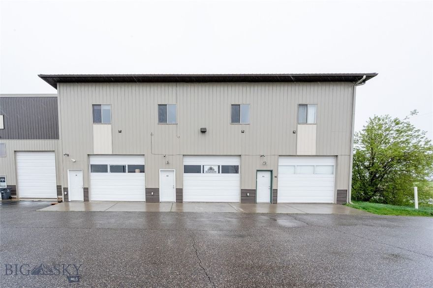 Welcome to this exceptional commercial condo opportunity, perfectly positioned to meet all your business or investment needs. Two of the units have a deck with a stunning backdrop of the Bridger Mountains. The other two units are west-facing and have paved parking. All units feature a substantial 39' x 14' heated shop—ideal for various trade applications, artistic endeavors, or entrepreneurial ventures. The thoughtfully designed office space upstairs provides a peaceful work environment with inspiring views and ample natural light, perfect for productivity. The 12" garage door ensures easy access, allowing you to conveniently store your belongings without any hassle. With its prime location near the airport, you’ll appreciate the ease of travel and close proximity to amenities, all while enjoying the peaceful ambiance of the surrounding area. These commercial condos are an excellent opportunity for those seeking a versatile space that accommodates both personal and professional pursuits.