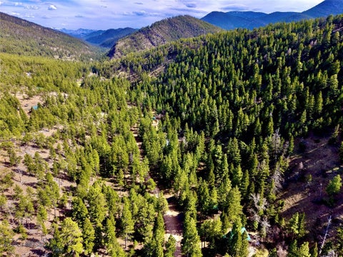 Photo of 3925 Little Wolf Creek Road, Wolf Creek, MT 59648 (MLS # 408558)