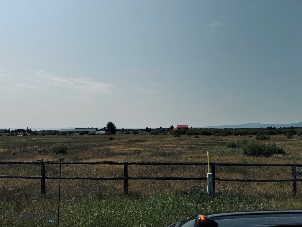 This 2 acre tract is flat and ready to build on. Great views in all directions. Year round access! Horses are ok too--- Very close to snowmobile trails, horseback trails and Hebgen Lake.