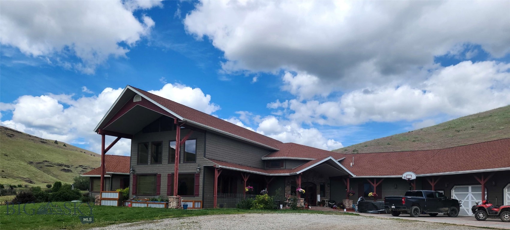 Over the past couple years this Montana dream property has expanded from 79 acres to an impressive 573 acre ranch, with a stunning 7,000 sq. foot custom home, including pasture acreage that borders a residential subdivision for potential income. Currrent ranch improvements include a new Hwy access road, jackleg fencing, portable corrals , maternity pens, calf chutes and sheds, round bale feeders, updated water spigots/pumps, a 2023 solar livestock well, automatic waterers, 2 livestock wells, a large chicken coop & more. The 32X72 shop/barn includes a tackroom/bathroom, laundry facilities, & plenty of room for recreational vehicles. This property is encompassed with 5 fenced pastures near the home and additional pasture acreage located across Hwy 28, which includes a new corral system, updated fencing, and spring fed water troughs. This acreage borders a residential subdivision, with an already established 20-acre residential subdivided plot, for the potential to maximize your investment. The luxurious home encompasses 3 large bedrooms (each with a full bath). The grand master suite includes an adjoined bathroom and double walk-in-closets. There are 2 guest bathrooms on each side of the house. The expansive living area features 26' cathedral ceilings, hickory floors with center plush carpet, a stone fireplace & walls of windows with breathtaking views. This home offers a laundry room, pantry & 400 sq. foot upstairs loft for office space. The 21'double doors enter a foyer with an expansive walk-in-closet. The gourmet kitchen features hickory cabinets & flooring, granite countertops on a T-shaped island, a custom stone sink, with top-of-the-line appliances including a wine cooler, 6 burner stove, 3 ovens & a built-in microwave. Modern comforts include a central vaccum system, radiant-in-floor heat, wood boiler, & a new AC unit. The 4-car heated garage boasts an upstairs bonus room offering additional living space for guests.
WELCOME to 39 Gunsight, Plains, Montana