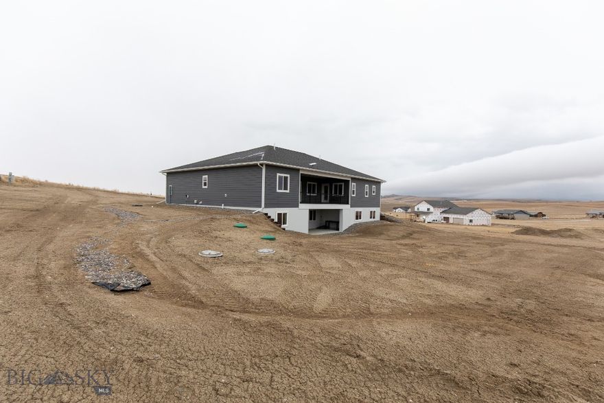 ROOM TO GROW!!!  Situated on over 1.5 acres of scenic countryside, this expansive 4,800 sq.ft home is an exceptional opportunity for buyers eager to create value through their ability to finish the basement.  The open concept main level offers generous living space, oversized bedrooms with walk-in closets, and a spacious primary suite complete with dual vanities, soaker tub, huge walk in shower and ample closet space.

A major highlight is the full, walkout daylight basement - unfinished and ready for your vision.  With electrical already run and drywall on site, this is an incredible opportunity for any buyer to complete at their own pace.  Whether you're dreaming of additional bedrooms, a home theatre, gym, or multi-generational living space, the groundwork is already in place, ready for a buyer to finish and customize while building instant equity.

Some perks of this home include, but not limited to; large mudroom with a utility sink, wide hallways and stairs making it easy for moving, generously sized pantry, central air conditioning providing year round comfort, a back covered deck with incredible country views, and an oversized 2 car garage complete with a storage room.

This home has so much to offer!!!