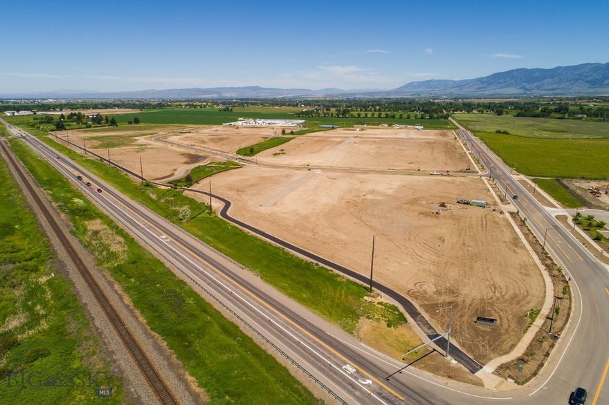 Nelson Meadows Subdivision - new M-1 zoned, master planned commercial subdivision in the City of Bozeman.  This premier location for businesses will link Bozeman to the Yellowstone International Airport and feature unrivaled visibility from I-90 and the Frontage Road just west of the 19th Ave. interchange and provide City Services.  Lot 22 is 2.44 acres, and is located right on the corner of Frontage Road and Nelson Road.