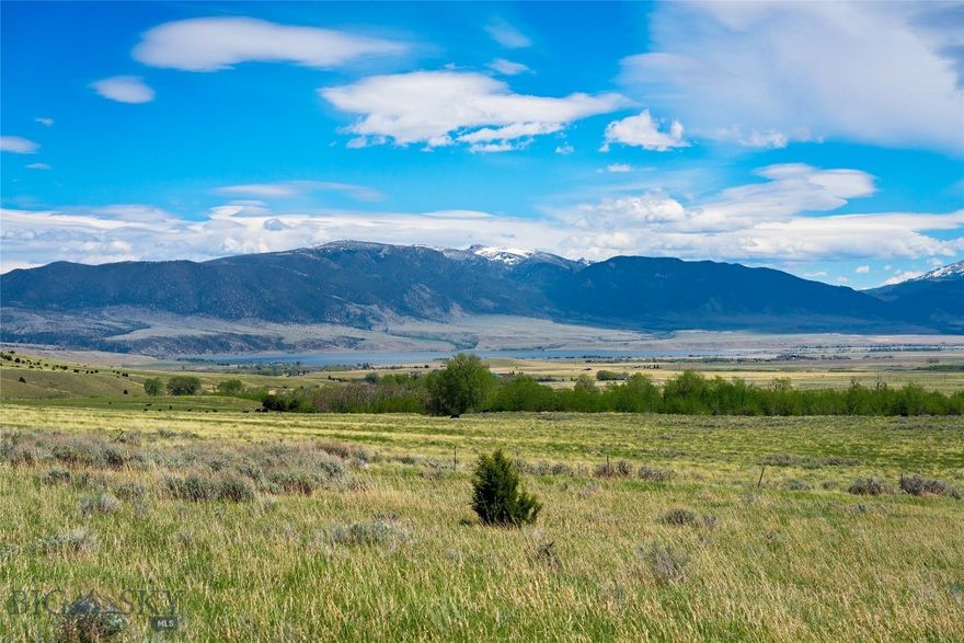 Spectacular Mountain & Lake Views!! A rare opportunity to own a 4.0763± acre parcel in South Meadow Creek’s desirable Stone Ridge Views Subdivision. Undoubtedly one of the premier lots in the subdivision, this exceptional property captures sweeping views of Ennis Lake, the Madison Range and Valley, and the Tobacco Root Mountains.
Adjacent to 9± acres of open space to the south and open ranch land to the east, the property offers a spacious, private feel with protected view corridors and breathtaking scenery in every direction.
Located near National Forest access, the Madison River, and Ennis Lake, the area offers endless recreation, including hiking, camping, Blue Ribbon fishing, boating, ATV riding, horseback riding, and more.
Power and fiber-optic communication lines are to the property. DEQ approval and a designated building envelope are already in place, making this parcel ready for your Montana dream home. Covenants and established building envelopes help protect your investment.
The lively town of Ennis is approximately 20 minutes away, with Bozeman and Bozeman Yellowstone International Airport less than an hour away.