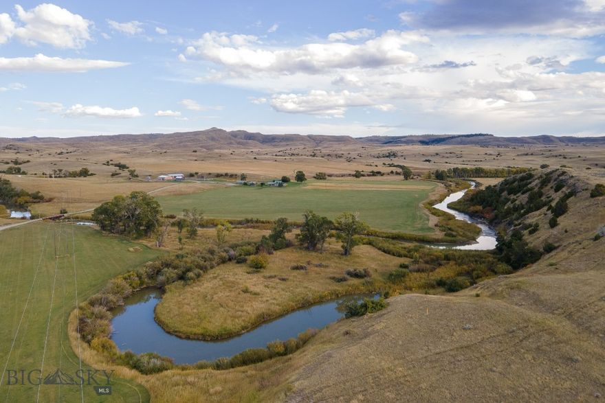 Hangman’s Creek Ranch is a premier recreational and agricultural property located just 10 miles north of I-90 and approximately 12 miles from Big Timber in the heart of Sweet Grass County, Montana. Ideally positioned between Billings and Bozeman, the ranch is within an easy one-hour drive of both communities, offering a rare balance of privacy and accessibility.
The ranch consists of 2,341± deeded acres along with 995± additional leased acres, providing expansive operating room for both livestock and recreation. Improvements include a 3,300± square foot renovated main residence, three additional guest housing units, a new barn with interior and exterior stalls, outdoor riding arena, and a heated 40’ x 80’ shop, creating a turnkey setup for ranching, horses, and equipment.
Water is a standout feature, with just under one mile of Sweet Grass Creek frontage, well known for its excellent brown and rainbow trout fishing. Additional seasonal spring creeks, including Sams Creek and Crest Creek, further enhance the property’s water resources. Approximately 28 irrigated acres support hay production and livestock needs.
The ranch is well-suited for a 175-200-head cow/calf operation, with existing infrastructure, pasture layout, and water access designed for efficient cattle management. Beyond agriculture, wildlife is abundant, including elk, mule deer, whitetail deer, turkeys, migratory birds, upland birds, and other native species, making the property highly desirable for hunting and recreation.
With its existing improvements and scenic setting, Hangman’s Creek Ranch also offers exceptional potential as a retreat or guest ranch, ideal for hosting outdoor enthusiasts seeking fishing, hunting, horseback riding, and hands-on ranch experiences, while enjoying comfortable accommodations and peaceful evenings alongside flowing creek waters.
Hangman’s Creek Ranch represents a rare opportunity to acquire a large-acreage Montana ranch combining productive cattle operations, strong recreation, exceptional water features, and proximity to thriving Western Montana communities.