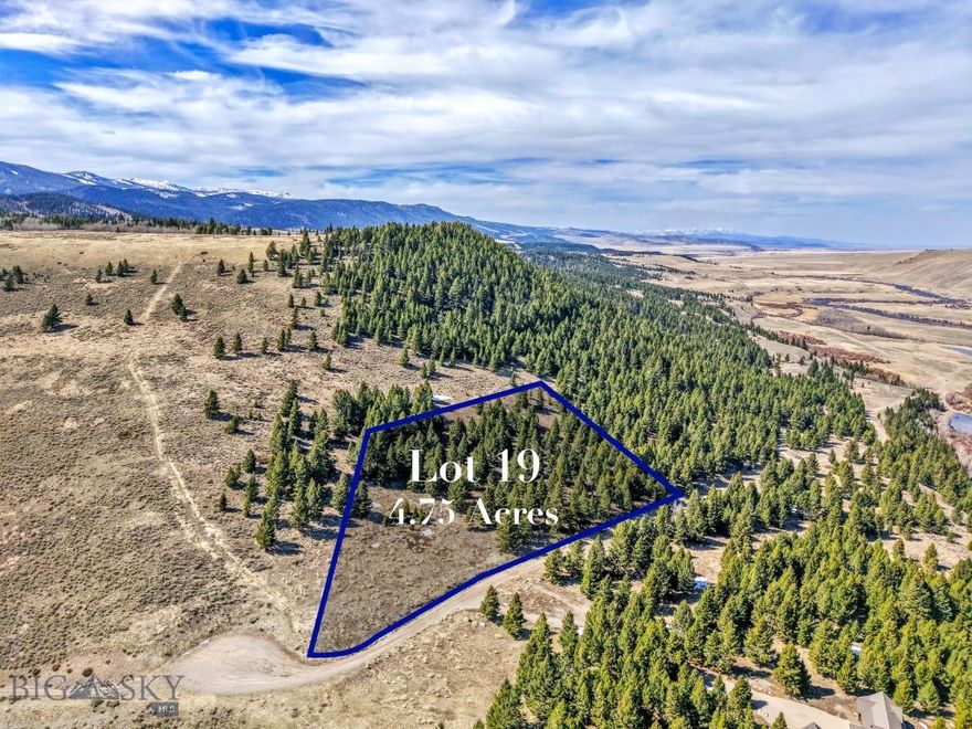 Discover the perfect balance of privacy, luxury, and adventure on this wooded, end-of-the-road 4.746± acre lot in the exclusive Sun West Ranch community in Cameron, Montana. Nestled among mature trees on a gently sloped site, this lot offers natural beauty, privacy, and a thoughtfully designated building envelope to help you create your ideal Montana retreat. Sun West Ranch spans over 2,000 acres of private, gated landscape with only 55 home sites and 1,700± acres preserved as open space. Residents enjoy shared wells, underground electricity and fiber optics to the lot, and year-round maintained roads.
The amenities are exceptional:
• Three miles of private Madison River access for world-class fly fishing
• Trout-stocked ponds
• Hiking and horseback riding trails throughout the ranch
• Clubhouse and equestrian center with stalls, tack lockers, a large outdoor arena, and a round pen
Wildlife abounds — moose, elk, deer, and the occasional bear are frequent visitors. Sun West Ranch offers peace and seclusion, yet it’s ideally located within an hour of Ennis, West Yellowstone, Big Sky, and Island Park, giving you endless outdoor recreation and amenities at your fingertips. Covenants and a design guide protect your investment and ensure the community’s high standards are maintained for generations to come. Sun West Ranch is where Montana dreams become reality. Come build yours here.
