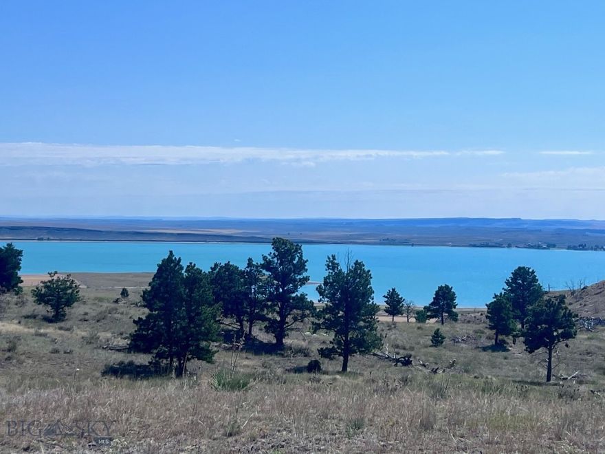 42+ acres of stunning Montana land overlooking Deadman’s Basin Reservoir. Discover your slice of Montana paradise with this expansive property, comprised of two separate parcels, offering flexibility and opportunity - build on one, develop the other, or hold as an investment. Nestled between the towns of Roundup and Harlowton, and an easy 1-hour drive from Billings, Montana’s vibrant hub. This land boasts breathtaking panoramic views of Deadman’s Basin Reservoir and surrounding mountain ranges, including the Crazy, Beartooth, and Snowy Mtns. Enjoy diverse terrain with rolling hills, mature trees, striking rock formations, and multiple prime build sites perfect for your dream home, cabin, or recreational retreat, ideal for privacy. A promising area on the property shows signs of a developable spring, offering a potential water source. Power approx. 1/4 mile away, great Solar potential.