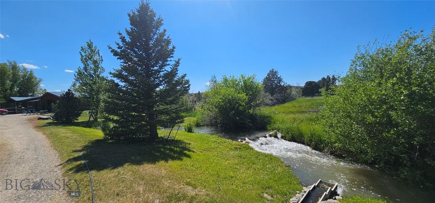 Bear Creek Beauty – Creek, Ponds, Views, and Privacy!

Don’t miss this exceptional property just minutes from downtown Ennis! Nestled on 9 scenic acres, this unique 2,552sq. ft. 4 bedroom, 2 bath home offers the perfect blend of natural beauty, privacy, accompanied by the peaceful sounds of the creek all with breathtaking mountain views.

Bear Creek runs through the entire property, bringing movement and life to the landscape, complemented by two peaceful ponds enhance the natural charm. Mature landscaping, surrounded by mature trees and abundant wildlife.
  

Inside, the open floor plan features a spacious kitchen, a dining area that opens onto  the back deck—ideal for barbecues, entertaining, or simply soaking in the scenery. Enjoy a cozy living room with large view windows, a generous family room with a fireplace, two primary suites, plus two additional bedrooms.
 
The grounds are a true standout, featuring mature landscaping and a mix of towering trees, including five spruce trees approximately 100 feet tall and 26 more ranging from 20 to 25 feet. A massive cottonwood, three additional cottonwoods between 30 and 40 feet tall, three aspen trees, and five mature willows provide beautiful shade and a sense of serenity in the backyard.  

For those who value privacy and protected views, the property backs up to the Longhorn Ranch, which is under a conservation easement—ensuring that the surrounding land remains undeveloped and preserved for generations to come.  This home is a rare find in a highly desirable location. Serenity meets accessibility—don't let this one slip away!