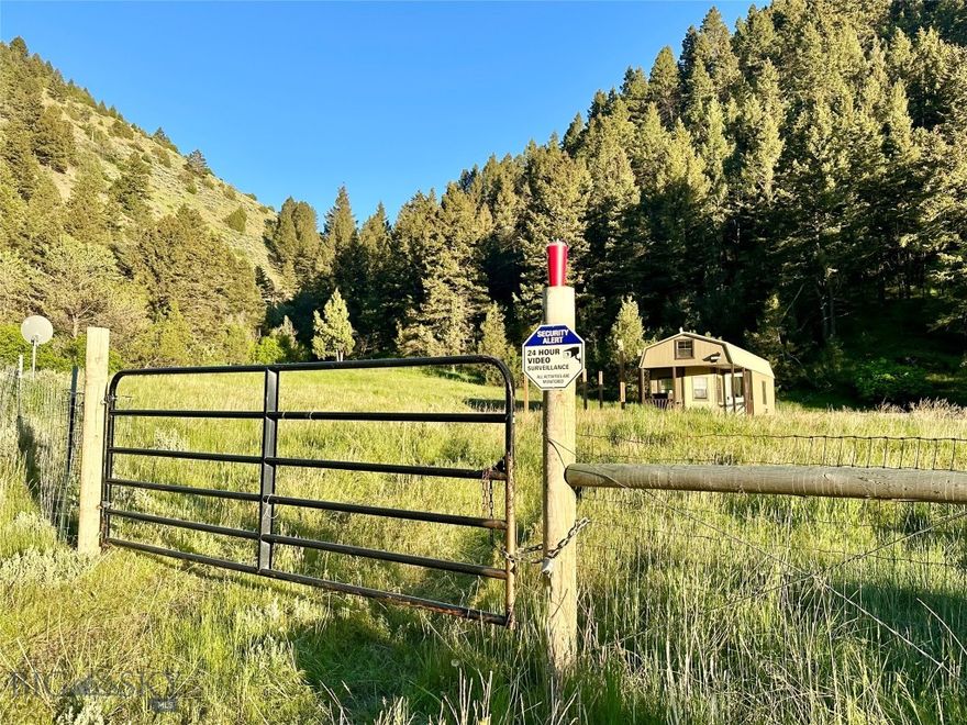 REMARKABLE NEW PRICE - 60 ACRES near Bozeman, Montana. Fun OFF-GRID CABIN for recreation or live here and build your Montana dream home. Set up with complete solar system and water rights for a developed spring. Cute pre-fab cabin furnished with indoor and outdoor furniture, appliances, and a wood stove heater. Off-grid system with water holding tank, solar arrays and batteries convey (propane tank is leased). The cabin is already prepped for a composting toilet. There is a nice covered porch to enjoy the views and an existing RV pad. Fun old forest road runs up the hill to the upper elevations of the lots. There is a DEVELOPED SPRING located on the neighbors lot with water rights and a recorded easement in place. The acreage is mostly wooded providing excellent wild life habit and privacy to hike and relax in nature. There are four separately deeded lots (two 10 acre tracts and two 20 acre tracts). Year round access with 4x4 as needed. The west side of the Clarkston community borders public land and the Missouri River, so outdoor recreation is nearby. Area attractions include Headwaters State Park & Buffalo Jump State Park and the Gallatin, Madison and Missouri Rivers offer fishing and floating fun. The local towns of Three Forks and Manhattan are ~25 miles and Bozeman is ~45 miles.