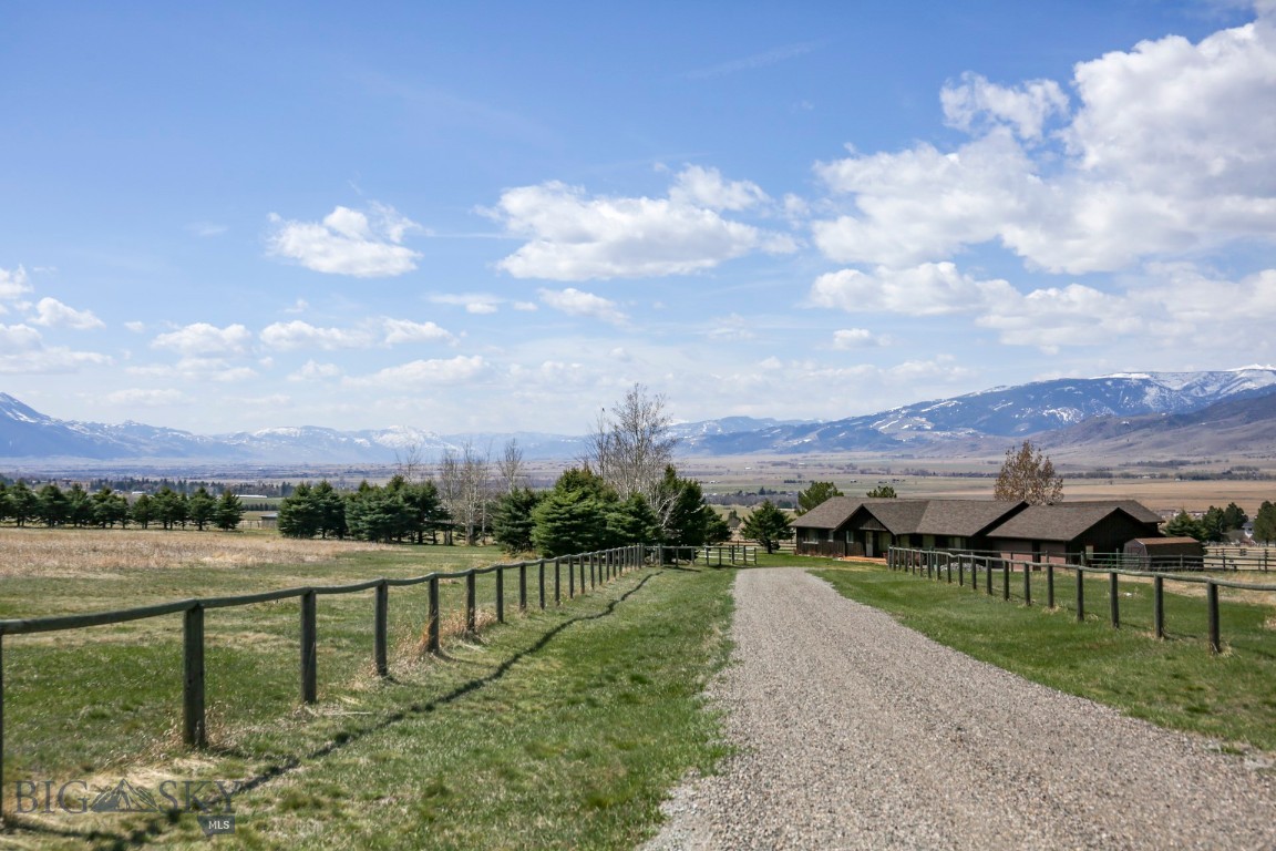 There is a very particular area of Paradise Valley which lies to the east of the Yellowstone River and in between the Pine Creek and Suce Creek drainages that is unquestionably some of the most sought after real estate in Montana, with spectacular mountains, cattle ranches that have been held for generations, and a sense of place that only comes with a community that knows one another.
Set in the heart of this famed area, on ten secluded acres, sits the Bench House, as the family call it. It has been owned by them for over thirty years and its open, easy floor plan has made it the ideal place for big gatherings in summer or quiet retreats in the winter when the snow flies. The picture windows in the comfortable living room are filled with the mighty Absaroka-Beartooth mountains, rising majestically to over 10,000' above the valley floor. There are two master suites, one on each side of the house with an additional two bedrooms and two baths. The roomy kitchen and dining area have the same sensational views. A triple attached garage has loads of room for toys, cars and sports equipment. Outside, in the grassy meadows there are stands of aspen and conifers where the deer bed down in the summer for shade, and vistas of snow capped peaks marching down the valley to Yellowstone National Park. Hiking trails into the wilderness are minutes away as are the world class blue ribbon Spring Creeks just a mile or so down the road. The historic Chico Hot Springs and Hotel are close by, as is the old western town of Livingston. Bozeman and its international airport is about forty five minutes away on I90.
Peaceful. Private. An absence of chaos. This feels like the pre-Costner Montana, the old Montana most of us are looking for. Lovingly maintained and lived in over the years, the Bench House is ready for new owners to carry on its legacy. Few people move once they're here, so places like this don't come on the market too often. Call now for an appointment to take a look or arrange a video tour.
