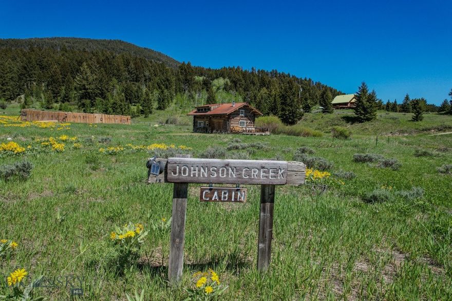 5.22 COMMERCIAL ACRES less than 30 minutes from the West Entrance of Yellowstone National Park—bordering Gallatin National Forest with views over Hebgen Lake. The remodeled log cabin currently operates as a VRBO, producing solid income with potential to offset future business or personal expansion. ——— ZONING + LAYOUT allow for multiple uses: add investment cabins, expand the rental business, develop a commercial venture, or create a private retreat. ——— ACCESS is immediate: Madison River fly fishing (15 miles), Yellowstone National Park (17 miles), Big Sky Resort skiing (31 miles), plus hiking, boating, hunting, snowmobiling, and more year-round. Waterfront access is a 2-minute walk; marina access, a 2-minute drive. ——— RARE opportunities to invest in commercial property in this area don’t appear very often. The combination of year-round outdoor activities makes the location perfect for a commercial venture or as a personal outdoor paradise.