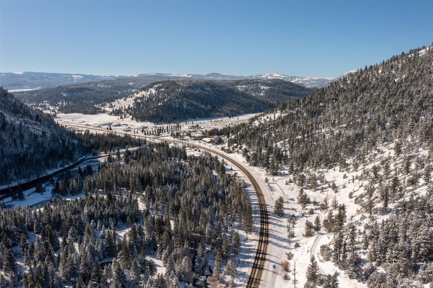 Prime 2.5-Acre Commercial Development Opportunity | Gateway to Big Sky, Montana. Unlock the full potential of one of Big Sky, Montana’s most
strategic commercial properties. Spanning 2.5 acres with premium Community Commercial zoning, this rare offering is located at the main
entrance to Big Sky, just off U.S. Highway 191—the primary route between Bozeman, West Yellowstone, and Yellowstone National Park’s busiest
entrance. Boasting exceptional visibility, high traffic exposure, and easy accessibility, this site is ideally positioned to capture year-round tourism
and local demand. Situated only one hour from Bozeman Yellowstone International Airport, this premier parcel offers unmatched access to
Bozeman, Yellowstone, Jackson Hole, and all of Big Sky’s resort and residential communities. With Big Sky’s population and visitor traffic rapidly
increasing, this is a powerful platform for investors, developers, and entrepreneurs to shape the town’s future. The flexible zoning supports a wide
variety of high-impact uses, including: Destination dining establishments | Curated retail and lifestyle boutiques | Boutique lodging or vacation
Photos
rentals | Professional and medical services | Workforce and mixed-use housing As Big Sky continues to grow into one of the Rocky Mountains’
most dynamic resort communities, this property represents a once-in-a-generation opportunity to contribute to its evolution. Whether you're
envisioning a commercial hub, a community-oriented mixed-use development, or a revenue-generating asset, the possibilities are wide open. Key
Highlights: 2.5-acre commercial parcel with Community Commercial zoning | Prime location at the gateway to Big Sky on US-191 | High visibility
and traffic from Bozeman, West Yellowstone & Yellowstone National Park | Flexible development potential: retail, hospitality, medical, housing &
more | One hour to Bozeman Airport and West Yellowstone entrance | Ideal for visionary investors and developers | Shape the future of Big Sky.
Develop where demand, vision, and location converge.