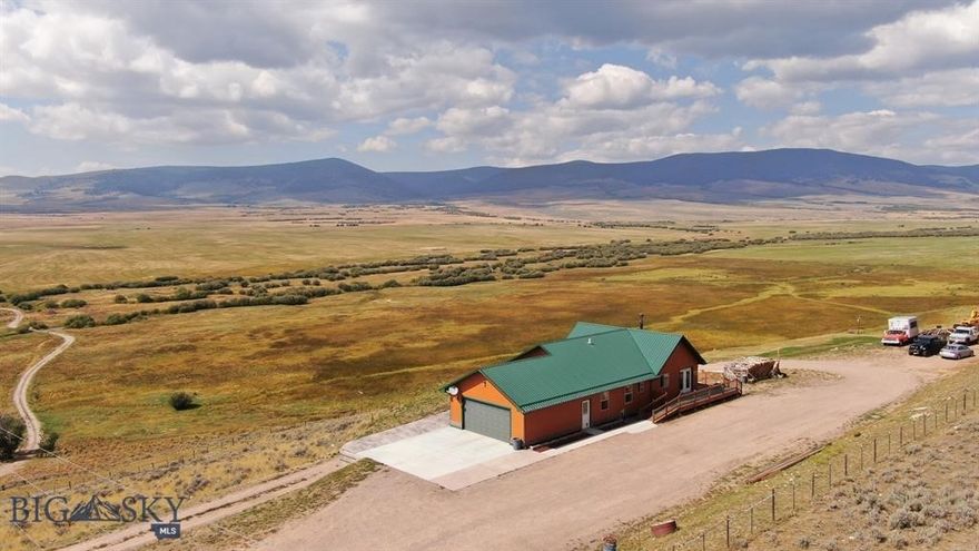 LIVE / WORK residence and business opportunity in Southwest Montana's Pioneer Mountains in Polaris, west of Dillon!

Perched high overlooking Grasshopper Creek and miles of timbered high country in the Beaverhead-Deerlodge National Forest including multiple high peaks and miles of public lands trail access.  Spectacular, panoramic mountain views, and close proximity to Maverick Mountain Ski Area and Elkhorn Hot Springs.  Approximately 30 miles to Dillon and 40 miles to Wise River.

The well-appointed residence is set up with two separate floors, each with independent kitchen and bathrooms, making the property ideal for short or long-term rental, outfitter quarters, or simply a wonderful home with separate living space.  Detached greenhouse has electrical service.  

Property is located in the heart of big game hunting and cattle country.  Business is ideally suited for meat processor, servicing both domestic and wild game animal processing.  The plant is professionally equipped and immaculately clean.  Offers big game transport "meat frozen and delivered to your door" service.  
Turn-key business includes client list, state-registered trademarks and recipes, plus all FFE, including refrigerator units, walk-in freezer, sinks, tables, slicers, smoker and all required equipment.  Detailed fixtures & equipment list is available upon request.  Business has dedicated propane, and shares electric and water with residence.  Residence has wood stove and electric heat.  Business is approximately 1890 square feet.  Home was built in 2008, and business in 1998.

Land line telephone and fiber optic service is provided by Southern Montana Telephone;  T-Mobile tower and Starlink services available.  Location offers great commercial visibility and access year-round, yet property is set off the highway for privacy and views.

Property listing information deemed accurate;  however, buyers are encouraged to verify the accuracy of all details.