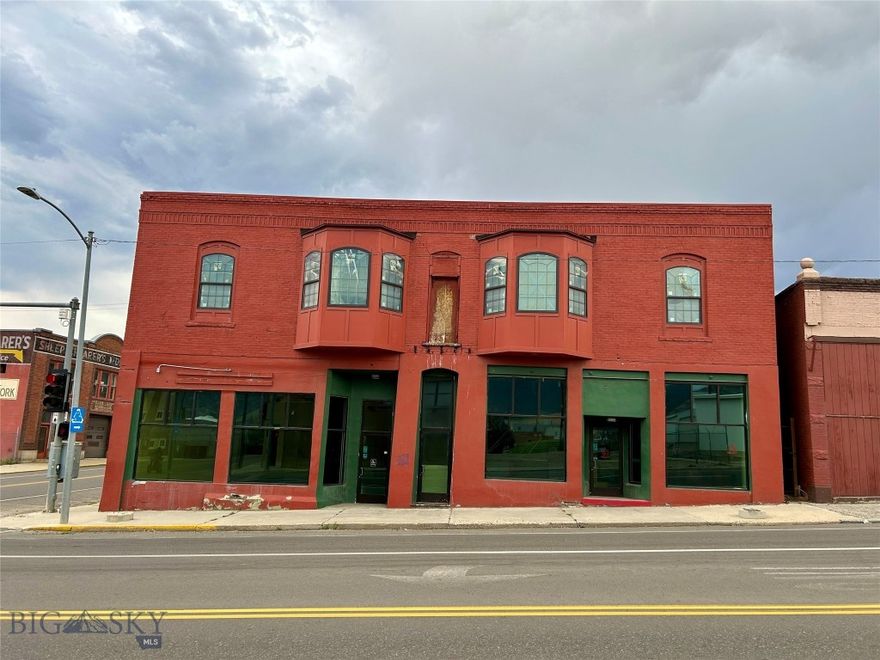 Versatile Commercial Building with Restaurant Setup This historic three-level building within the Uptown Butte URA boundary, offers excellent potential for restaurants, retail, offices, or mixed-use development. The main floor features a partially equipped (<2,400 SF) restaurant space (including grill, hood, sinks, and walk-in cooler), plus (<1,200) SF of adjacent leasable space and a separate (~400 SF) area with separate entrance. The unfinished top floor (<4,500 SF) presents a blank slate for apartments, offices, or expansion. The basement includes ample storage, a private office with bathroom, and another walk-in cooler. 
Key Features: 
* 5 separate entrances for multiple tenants 
* Existing restaurant infrastructure (buyer to complete setup) 
* Flexible spaces ready for immediate use or development 
* Prime Uptown Butte location with high visibility.
Ideal for investors, restaurateurs, or entrepreneurs seeking a high-potential property in Butte's historic district.