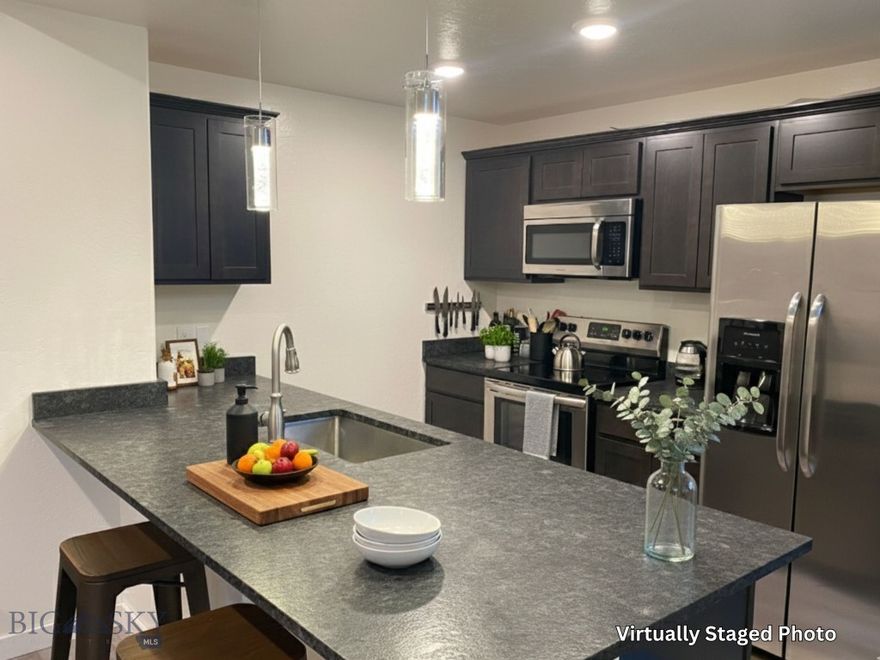 If your next Butte buy needs to be easy to own, easy to rent, and easy on your stress level, this townhouse in Unit 2 deserves a star next to it. This refreshed, well-cared-for unit offers 3 bedrooms and 2 bathrooms with a simple, functional layout that actually works for real life. Built in 1919 and updated over time, it features a modernized kitchen, updated bathrooms, newer flooring, and clean interior finishes that feel fresh without being high maintenance. You get a welcoming covered porch out front and alley access out back for flexible parking—a big win whether you choose to live in it or rent it out. Close to Uptown Butte’s parks, schools, shops, and everyday amenities, this unit sits in a strong rental pocket with consistent demand. If you’re looking for a stable, manageable investment and a smart next move for your portfolio, Unit 2 is the one you don’t overthink—you just go see it.