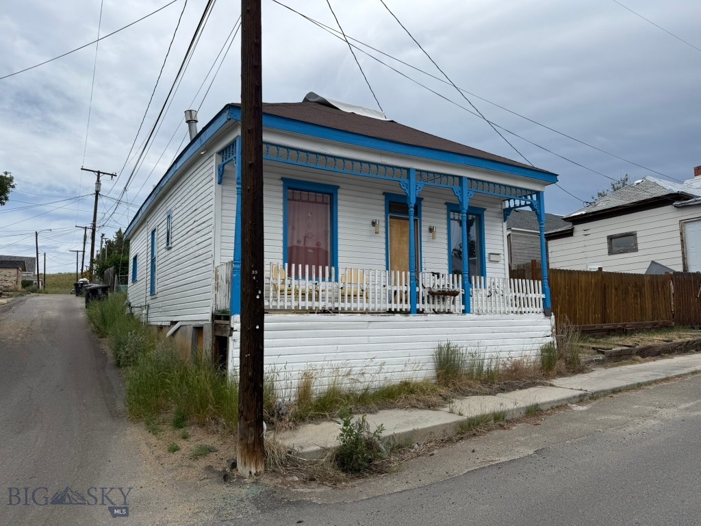 A modest yet charming cottage style house in Uptown Butte. The main floor features a living room, a generously sized kitchen, dining area, one bedroom and one full bathroom. The second floor is loft that is approximately half the size of the main floor, offering one additional bedroom and an open flex space. Abundant natural sunlight fills the living areas thanks to its desirable south-facing orientation. A covered front porch adds to relaxing outdoor space.