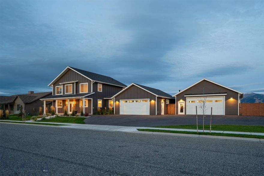 This custom-built home sits on nearly half an acre in the coveted Ryen Glen subdivision of Belgrade, MT, offering unobstructed views of the Bridger Mountains. Located at 2019 E Silver Circle Drive, this light and bright 4-bedroom, 2.5-bath residence features engineered hardwood floors and a thoughtfully designed layout. The main-floor primary suite offers a private retreat with a walk-in tiled shower, while white quartz countertops elevate the kitchen’s clean, modern aesthetic. The living area is anchored by a striking stone fireplace, creating a warm and inviting gathering space. Upstairs, you’ll find a second living room along with three additional bedrooms, providing flexibility for guests, home offices, or recreation. The home also includes a heated 2-car attached garage and a heated 2-car detached 30x30 shop with 10 foot ceilings, 9 foot garage doors and a pull-through bay and hot water—ideal for projects or extra storage. Plenty of off-street parking adds even more convenience. Set on a spacious lot in one of Belgrade’s most desirable neighborhoods, this home blends custom craftsmanship, comfort, and Montana views.