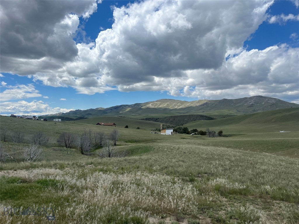 This 8.78 acre parcel offers a blank canvas with views 360 views of the prairie and mountains. Offers a getaway for great hunting and fishing in the area, with the Missouri River nearby.  The cabin is a bare, dry cabin with electricity on the edge of lot nearby. Is a 35-minute drive from Three Forks, 45 minutes from Belgrade.