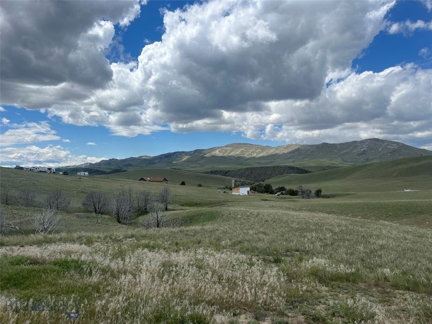 This 8.78 acre parcel offers a blank canvas with views 360 views of the prairie and mountains. Offers a getaway for great hunting and fishing in the area, with the Missouri River nearby.  The cabin is a bare, dry cabin with electricity on the edge of lot nearby. Is a 35-minute drive from Three Forks, 45 minutes from Belgrade.