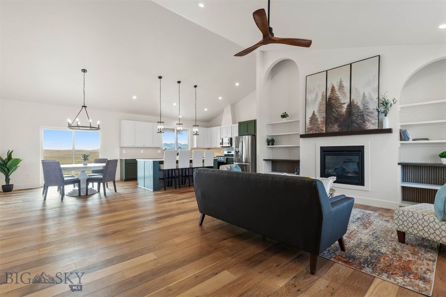 Discover this newly constructed 3-bedroom, 2.5-bath single-level home nestled on 1.3 acres in the desirable Village at Elk Ridge. Thoughtfully designed with tasteful modern finishes throughout, this home offers an inviting, open-concept layout filled with natural light. A stunning fireplace serves as the living room’s focal point, beautifully framed by arched built-ins that add warmth, charm, and custom character. Enjoy sweeping views of the surrounding mountains and valley, with the added bonus of backing to open space for privacy and a peaceful setting.

The spacious kitchen features contemporary cabinetry, quality fixtures, and a bright, functional flow ideal for both everyday living and entertaining. The primary suite provides a comfortable retreat with a well-appointed bath and generous closet space. Two additional bedrooms offer flexibility for guests, an office, or family needs. 

The landscaping will create a welcoming first impression and enhance the home’s clean, modern aesthetic. With ample room to enjoy the wide-open Montana feel, this property delivers a perfect blend of comfort, style, and setting.