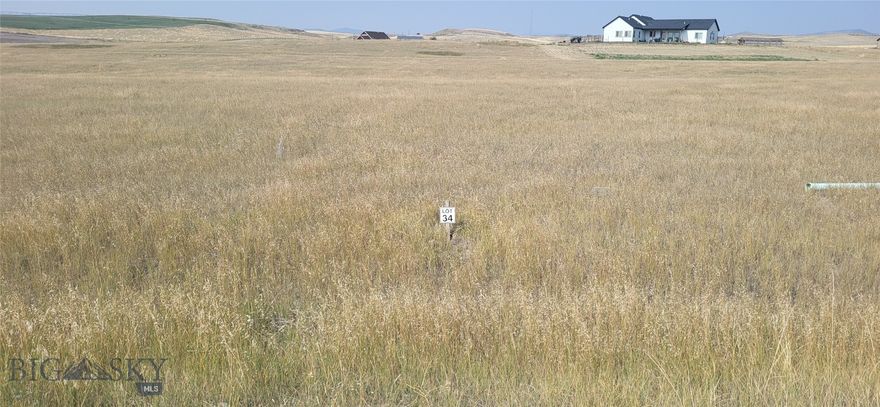 Located in Mountain Vista subdivision just outside of Three Forks, MT, this 1.01-acre parcel offers the perfect setting to build your dream home. Enjoy panoramic views of Montana’s stunning mountain ranges and vast open skies. Whether you’re looking for peace and quiet, or easy access to nearby amenities, this property provides the best of both worlds. 15 minute drive to town and 24 minute drive to the airport. It's an ideal location for those seeking a slower pace of life and a true Montana lifestyle.  Lot 33 and Lot 34 can be purchased together for $110,000 (see
MLS #405722).  The sellers have a soils survey completed by Rawhide Engineering that they will share with an offer.