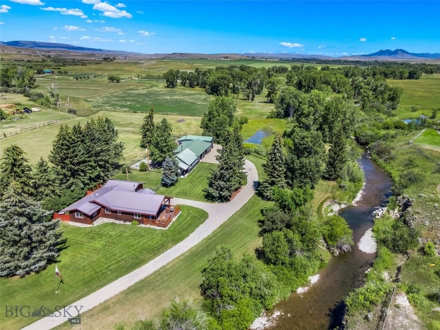 Beautiful Getaway just south of Wilsall, in the Peaceful Shields Valley. 7.33 Acres including both sides of the Shields River for 650 ft. Properties like this are becoming a rare find. Wonderful 1788 Sq. ft. 2 Bedroom, 2 Bath home with a wonderful, covered deck to listen to the river. Open Living Room, Kitchen and Dining with vaulted log beams, beautiful Fir flooring, granite kitchen, all appliances. The home is heated with Propane forced air and a fabulous wood stove on those long winter nights. Unattached garage at the house and a large outbuilding that contains a game room, Storage, workout room, heated space large enough for a couple automobiles, along with loads of cold storage for all the toy and equipment. Several acres of pasture that is split into 3 individual paddocks. There is also a stall in the outbuilding for livestock. This Property is meticulously cared for and available for showing. If you are looking for a quiet getaway or home on the river within 45 minutes of Bozeman,