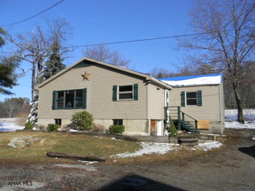 Vinyl Ranch with 2Br/1BA in peaceful location near town. Featuring a large eat-in kitchen with lots of cupboard space and huge, well-lit living room, walk-up attic and full unfinished basement. Offered AS-IS, WHERE IS. A good investment opportunity. Located in Somerset, PA, Somerset school district.