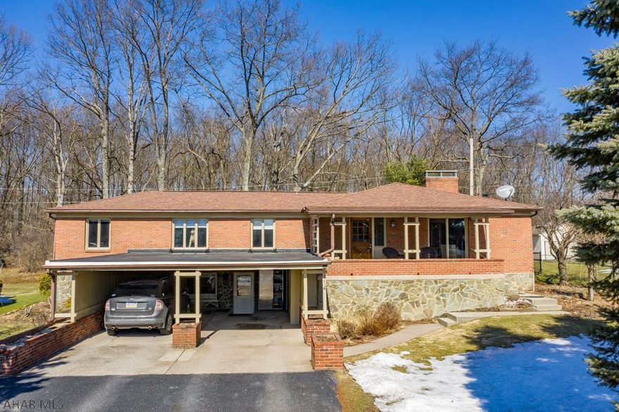 Three bedroom, three bathroom home in Sylan Heights! This home features a large stone fireplace in the living room & dining room. Enjoy the convenience of first floor laundry! Spacious kitchen with granite counter tops & plenty of storage. Three bedrooms, including the master bedroom with ensuite & another 3/4 bath are on the first floor. Hardwood floors through out. Basement features a large area with kitchen, another 3/4 bathroom and its own separate laundry hookups and storage area, making for easy entertaining or would be the perfect in law suite! Fresh paint, new light fixtures, all new interior doors, outdoor fence & updated electrical are just some of the updates done to this home! One year home warranty included!