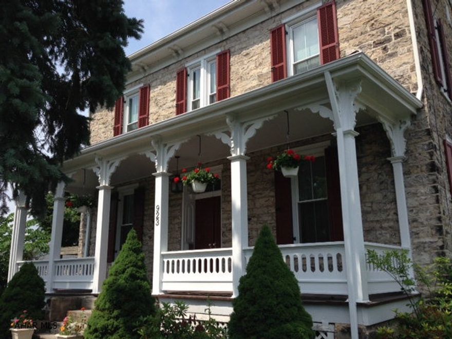 This historic home on .5+ acre has all the charm + period with modern day amenities of central air, updated wiring, windows. Plus a detached 5 car garage with roof area for RV! Home has 4-5 bedrooms (Master Suite), 3 updated bathrooms, 1 half bath. This beautiful home has landscaping + 1/2 circle driveway. Enjoy historic beauty with modern day amenities! See pictures.