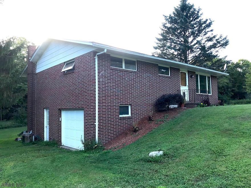 The timeless brick rancher on a beautiful 5 acre+ lot. Lot features a pond and flat cleared land with minimal woods. Gorgeous mountain views. Perfect location near 99/220 and the Bedford Airport. Home is move-in ready! Beautiful hardwood floors and bountiful natural light. Fully updated kitchen with new everything. Basement has integral garage and a bonus room that could be rec room or fourth bedroom. Set up your showing today!