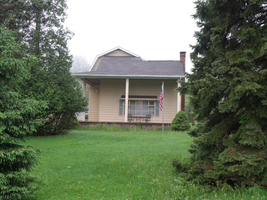 If you are looking for space, you have found it!!  This 4-5 bedroom home offers spacious room sizes with an open floor plan.  The huge kitchen is U shaped with an abundance of counter space and cabinetry.  The property has a 2 car carport and 2 -1+ garage spaces.  All of this on over 3 wooded acres.