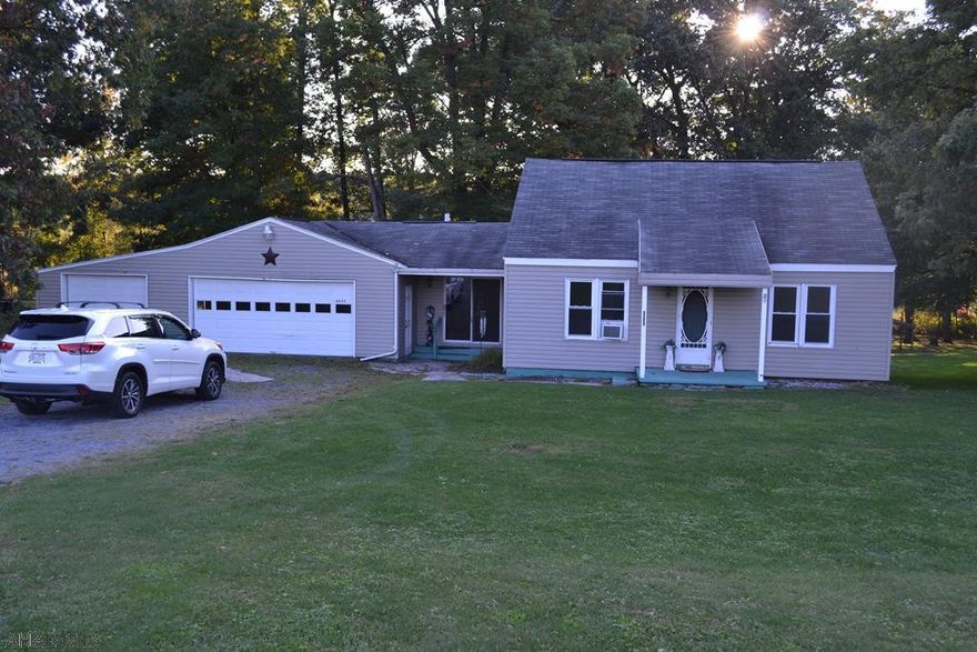 This mobile home is in very nice condition, has a big deck out back and a covered front porch, well landscaped with a water feature off the front porch. Nice shed out back. Motivated seller bring offers!!