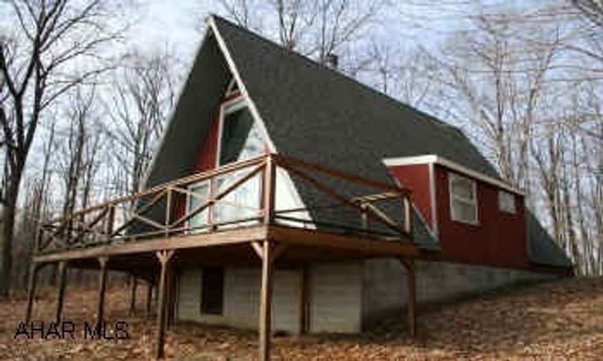 Contemporary A-Frame on 11.3 acres; open floor plan; spectacular views of the mountains; privacy. Large deck with views; new roof in 2001; new carpeting, refrigerator 1 year old; new plumbing in kitchen & BA., thermal glass and storm windows.