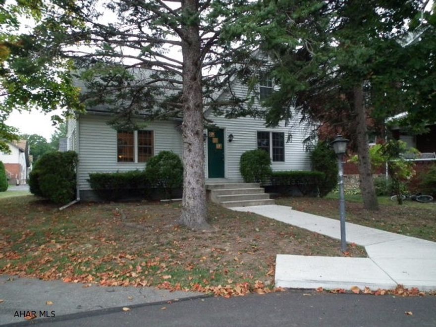 Take a closer look! Located on a corner lot, this 1 1/2 story home is located in Llysween area on .26 acre. Home offers 1st floor bedroom and full bath, large living room with plenty of natural light, kitchen has eat-in area. Detached 2 car garage. Proposed 2017 taxes $1941.84.