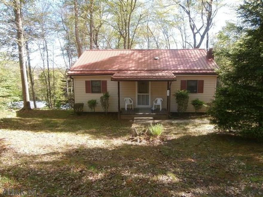 Very clean and well maintained cottage great for that relaxing any time of year get away. Large living room and equipped kitchen. New roof. Wood/coal burner in living room. Rear deck overlooking the wooded lot. Storage shed. Glendale yearound amenities available along with Prince Gallitzin State Park and Rock Run Recreation area nearby. Walk to State Game Lands.  Very nice cottage at a great price!