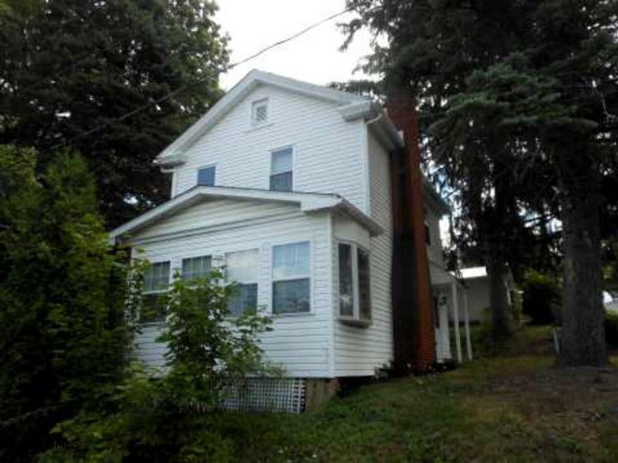 This is a move in home with room to customize. The property features an extra large 100x120 lot with off street parking and rear patio. The lot has a very large shady private area in the rear. The roof is newer and the mechanics have been updated.Large living room with fireplace. Move in and customize this home to fit your tastes. This home is geared toward those who are handy and investors.