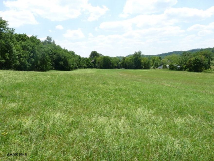 Beautiful 48(+/-) acres of woods and fields located 6 miles from Bedford with easy access to Rt 30 and I-99. The property includes a 40' x 69' wood barn and an abandoned 2-story, 3 BD-1 BA brick house with spring water, septic, and electrical service. The upper hay field and woods have wonderful scenic views while the lower hay fields and woods, with a small stream, offer full road frontage. This property has several potential sites for building your new dream home and creating your own special farmette.