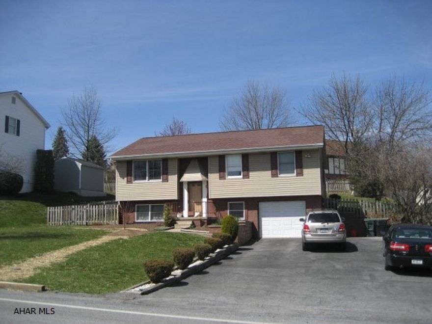 Split Entry move in condition bright 3 bedroom 2 full baths sun room fenced yard 2 level deck fenced in yard finished basement with full bath garage