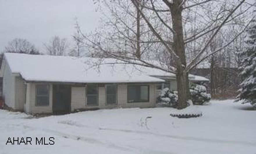 Ranch, no basement, asphalt shingle roof, detached garage in poor condition, needs work. Ranch, no basement, asphalt shingle roof, detached garage in poor condition, needs work.