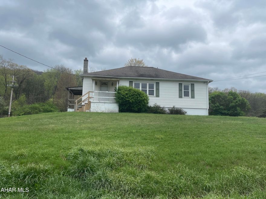 Let's move to the Country - if you're not afraid of a little bit of elbow grease - This home would prove to be a good move!!! Nice Hardwood floors - just needs spruced up! Home is situated on a nice size corner lot! Selling ''as-is'', seller to make no repairs.