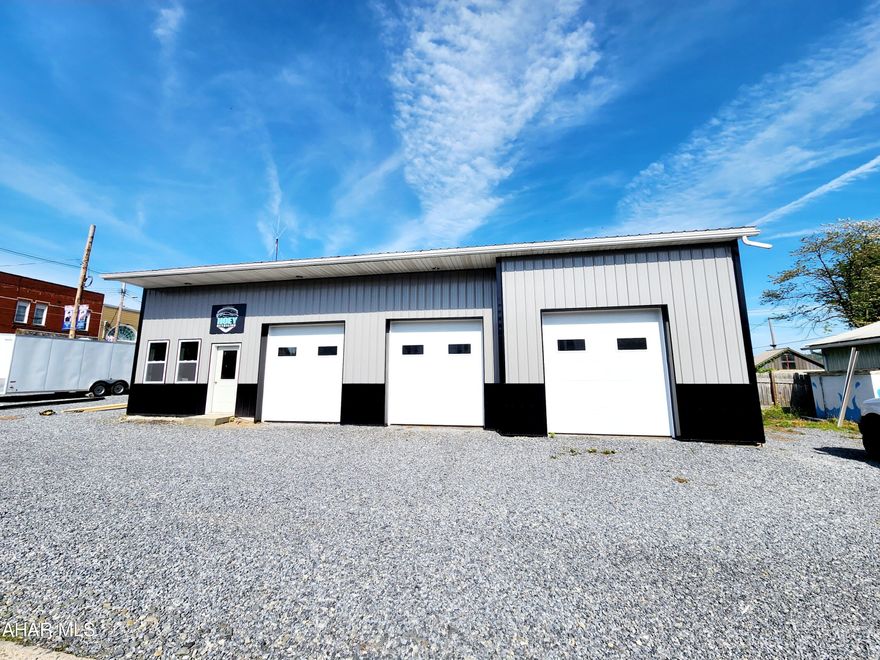 Great opportunity to open a business in the heart of Williamsburg. This property is situated on the main street in Williamsburg close to restaurants, coffee shop, and businesses. The owner has done many upgrades including: siding, windows, garage doors and openers, and more. There is space for an office and bathroom if the new owner wanted to finish those areas. The main garage is 12.5ft ceilings, electric and water. The smaller garage has no utilties.  Call for more information.