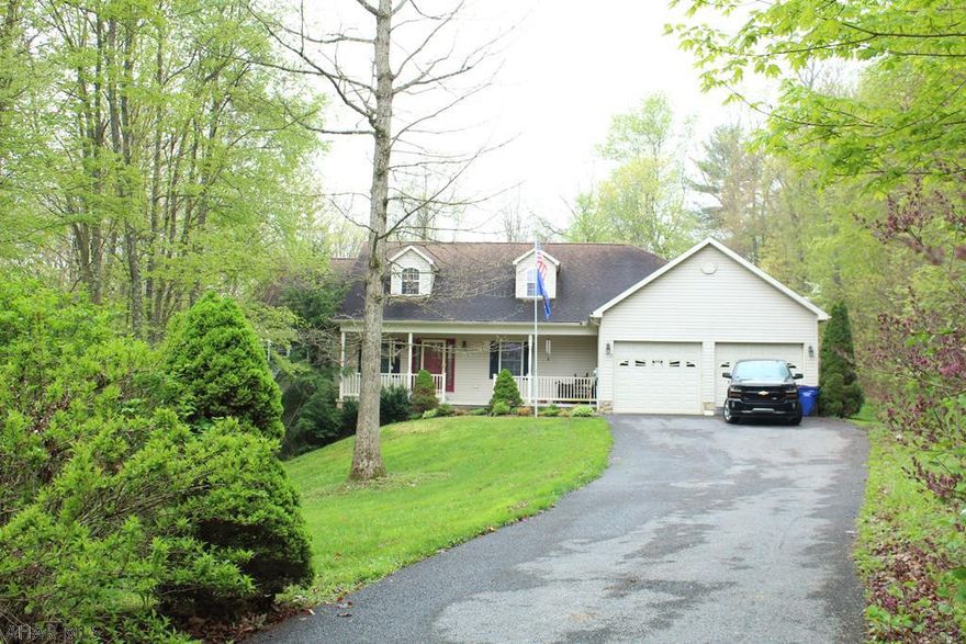 Impressive Cape Cod located in Ridgewood Heights.  3 bedrooms, 2  baths on first floor, bonus room and 1 bath on second floor, hardwood floors, fireplace, stainless steel appliances, and laundry room on first floor. Finished basement with a family room with fireplace, kitchen, and  bath.  New garage door and shed.  Backs up to the woods at the end of the cul-de-sac.  Large home with lots of room for everyone!  Tons of storage.