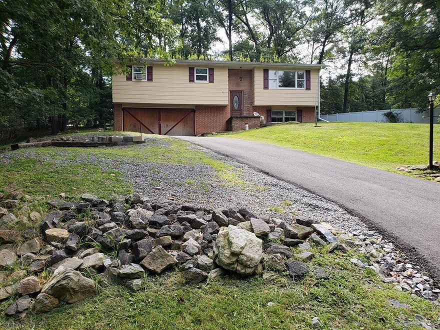 Tremendous location!!! 3-bedroom 2-bath split entry with 2-car integral garage, blacktop drive, family room w/fireplace on .48 Acres.  Seller selling as is...so much potential!  Nice back yard.  Electric System is Breakers.  J-444