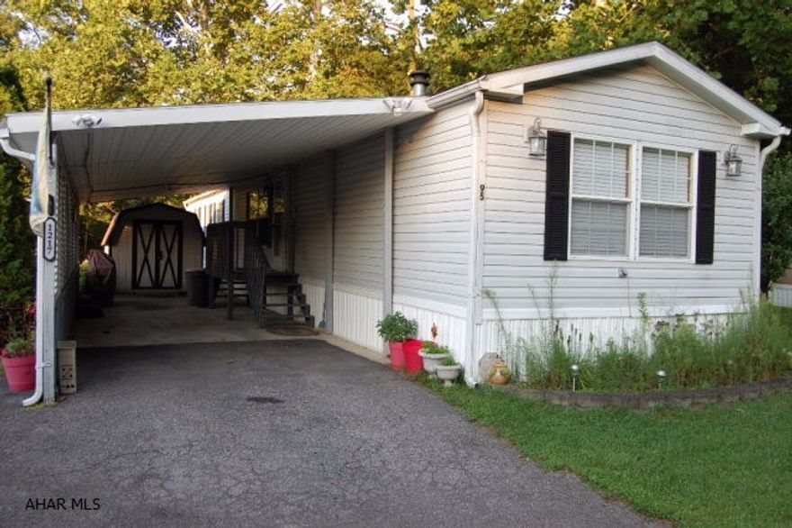 55 and over community.  Great 80X14 Colony single wide home that offers 3 bedrooms, 2 full baths and a nice large deck off back to entertain. Central air and new roof.  Master bedroom has a full bath that includes a nice garden tub and double sink along with a shower.  Park your car under the carport in the winter months.  Large storage shed included as well.