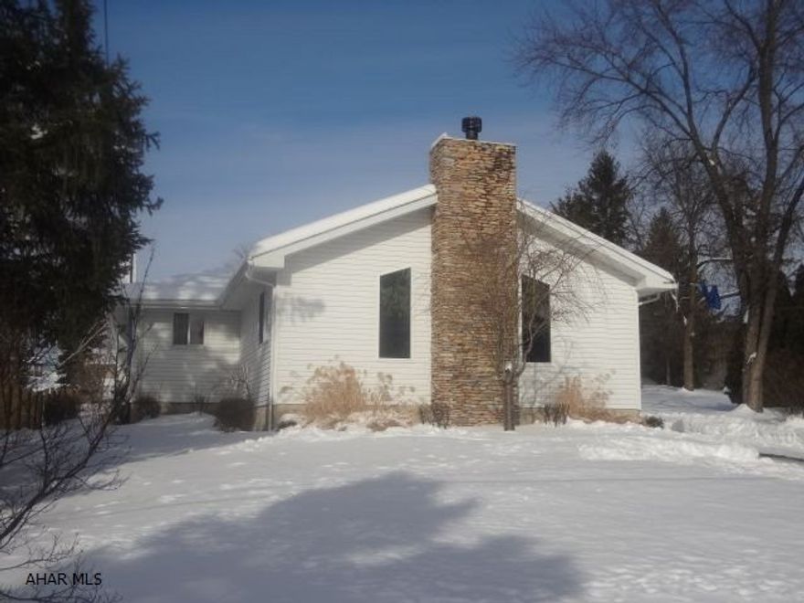 Great ranch home in Bellwood school district.  Large 60 x 316 Lot with 3 bedrooms, 2 bathrooms.  Very large Great room with fireplace.  Large 2.5 car detached garage.  Completely finished basement.  Home is waterproofed and guaranteed by Mihalko's.  Hardwood floors, central air.  Furnace is 3 years old.