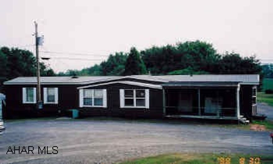 1985 Marlette Mobile Home with 7x22 tipout Lot rent includes water/sewer/trash
