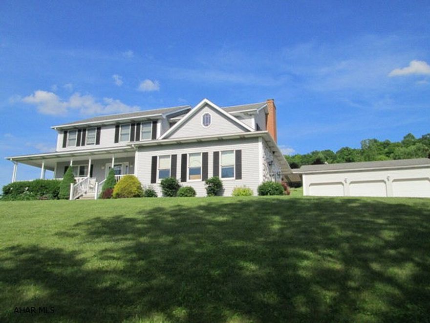 Hollidaysburg/Scotch Valley. Scotch Valley Estates is at the beginning of Scotch Valley. Close to everything, but 2.8 acres gives privacy. This 4200 sq. ft. house features large bedrooms with walk in closets, newer kitchen with quartz countertops which leads to a cozy family room with gas fireplace. The family room french doors open to a beautiful heated inground pool with slide. Three car garage.