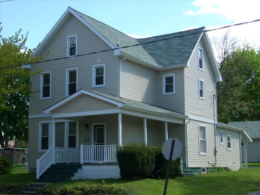 Nicely Renovated 2 1/2 story home, new kitchen, bathrooms, windows, 3 car detached garage.  Corner lot.  Wow! Must see. Completely remodeled.  Bellwood Borough Home.  Hardwood floors, central air, covered porch, rear patio.  Priced to sell!!